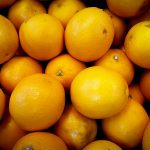 A close-up view of fresh oranges showcasing vibrant colors and textures.